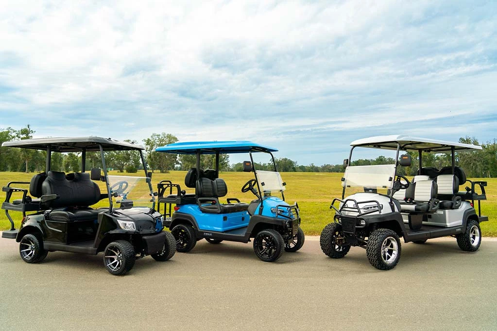 Three different brand golf carts lined up side by side for a comparison of reputable golf cart brands