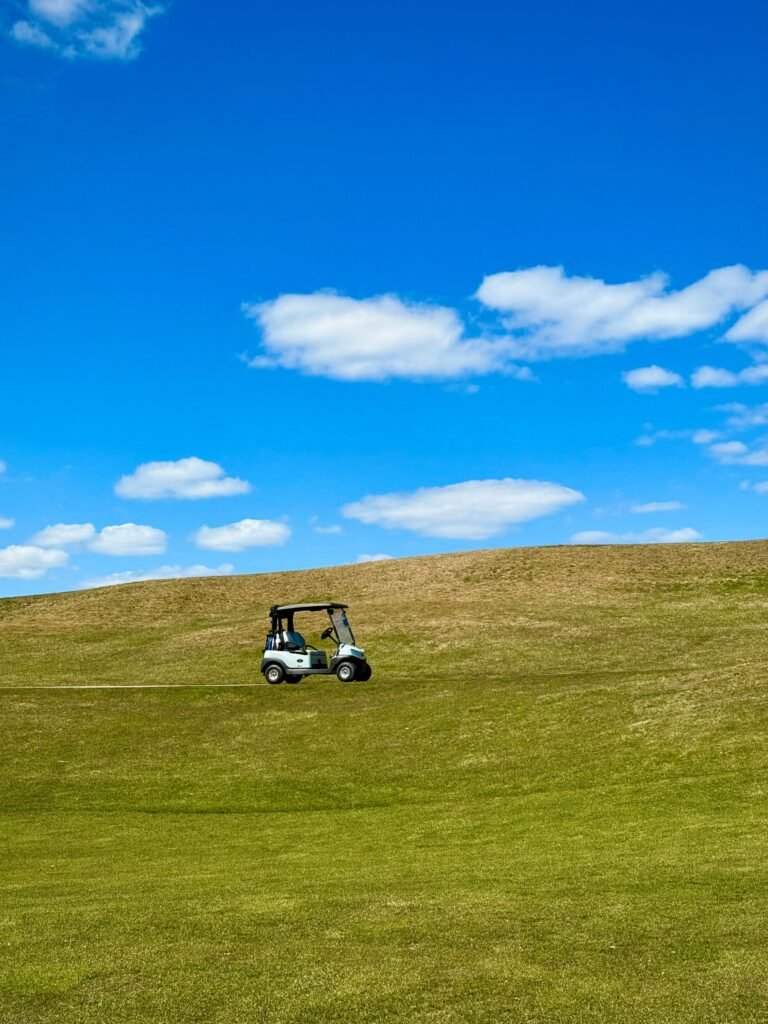 golf cart on green hills showing long lifespan