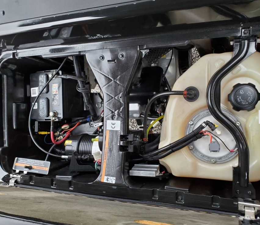 Club Car Precedent under-seat battery and wiring bay near the OBC, relevant when the Precedent won't go forward or reverse