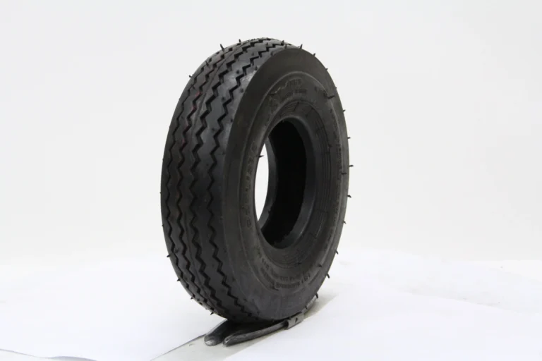 Sawtooth turf tire tread on a golf cart, the tread pattern shared by the best turf tires like Carlisle Fairway Pro and Wanda P5024