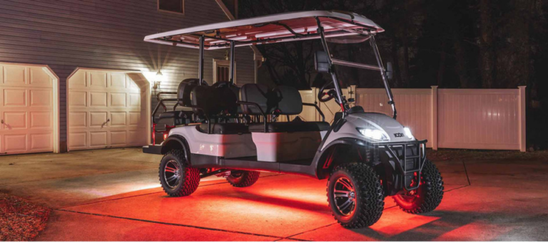 Golf cart with 10L0L style aftermarket underglow lighting and accessories installed