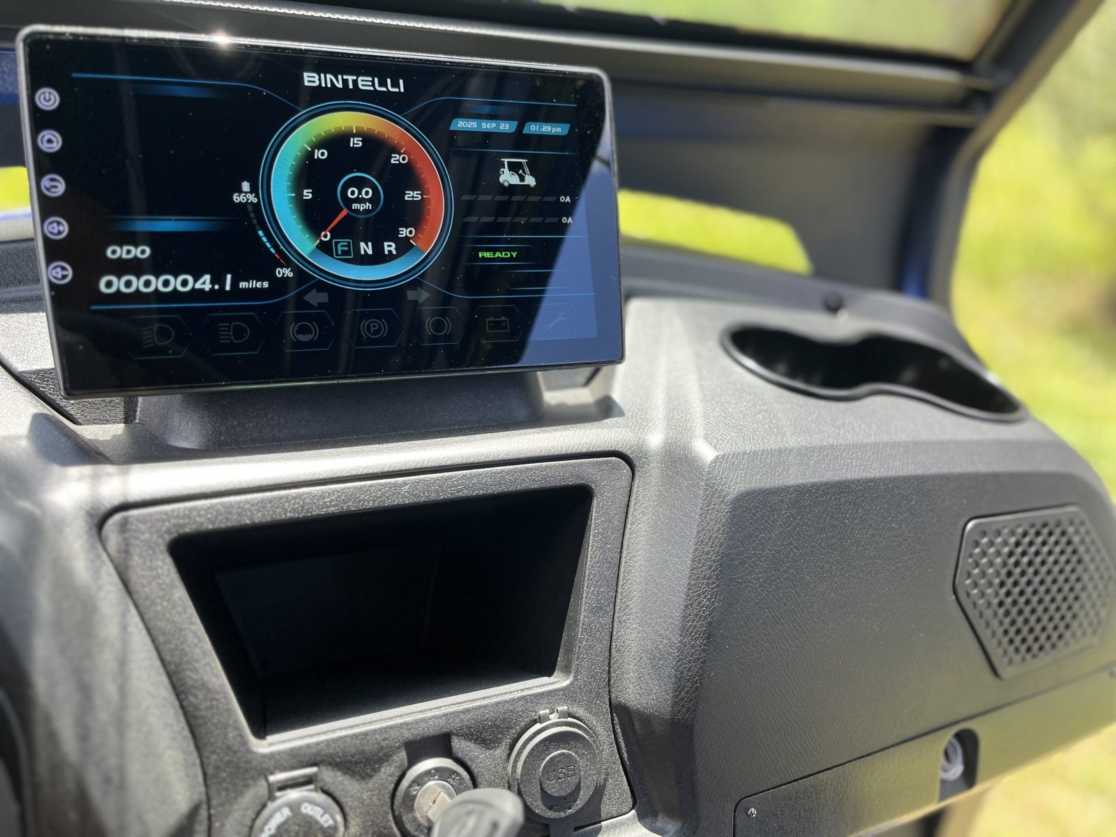 Bintelli Beyond LCD dash display showing a fault warning, relevant to reading Bintelli golf cart error codes