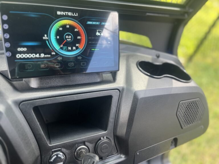 Bintelli golf cart dashboard display showing speed and battery, relevant to a beeping or blinking warning guide