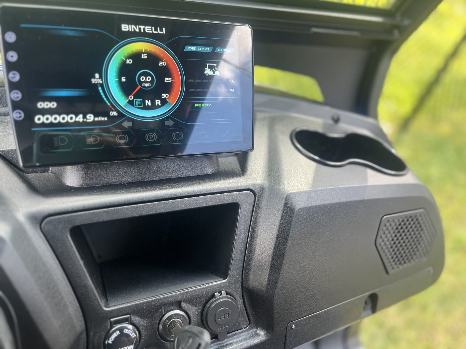Bintelli golf cart dashboard display showing speed and battery, relevant to a beeping or blinking warning guide