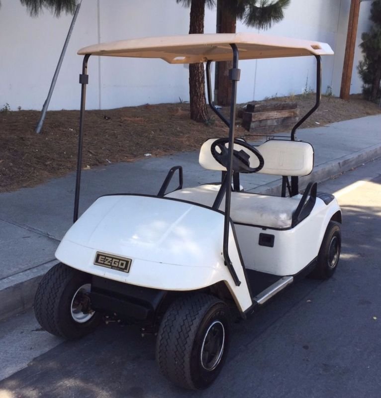 E-Z-GO golf cart used to illustrate locating and testing the tow run switch